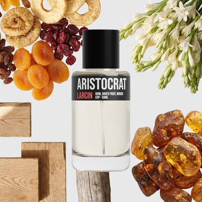 Aristocrat scent notes — golden spice, amber, resin, tobacco, smooth woods — Larcin
