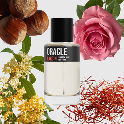 Oracle scent notes — pear, rose, creamy florals, sandalwood, amber — Larcin