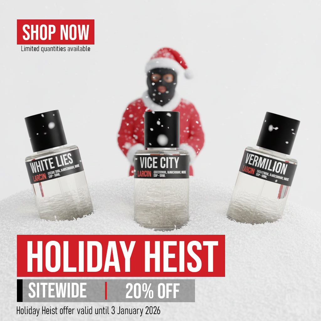 Three perfume bottles with labels 'White Lies', 'Vice City', and 'Vermilion' on a snowy background with a person wearing a Santa hat.
